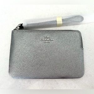 Coach silver metallic wristlet